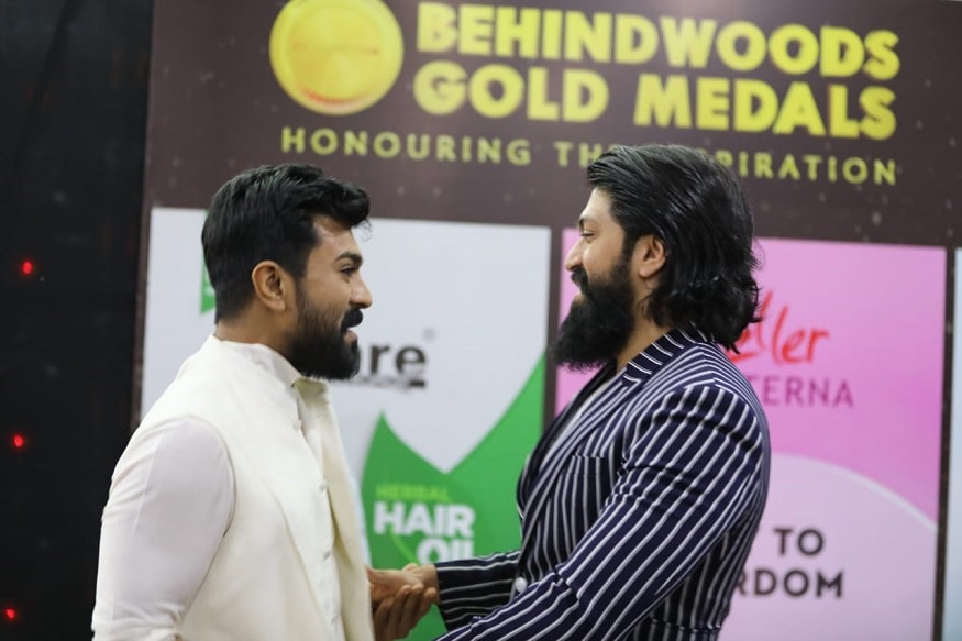 ram charan met kgf hero yash behindwoods gold awards,ram charan,yash,yash about ram charan,yash funny comments on ram charan,ram charan instagram,ram charan facebook,ram charan twitter,yash instagram,yash twitter,yash facebook,behindwoods gold awards,yash movies,yash interview,hero yash funny comments on ram charan look,kgf hero yash funny comments on ram charan look,ram charan vs yash,ram charan and yash,ram charan vs yash dance,rocking star yash,yash and ram charan,yash vs ram charan dance,ramcharan loves yash acting,yash talks about ram charan,రామ్ చరణ్,యశ్,యశ్ రామ్ చరణ్,రామ్ చరణ్ పై యశ్ ప్రశంసలు,బిహైండ్ వుడ్ గోల్డ్ అవార్డ్స్