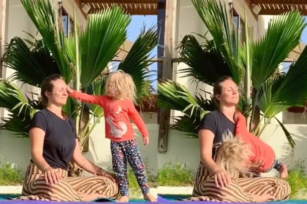 యోగా చేస్తున్న తల్లి... ఆటపట్టించిన చిన్నారి... తెగ నవ్వుతున్న నెటిజన్లు...