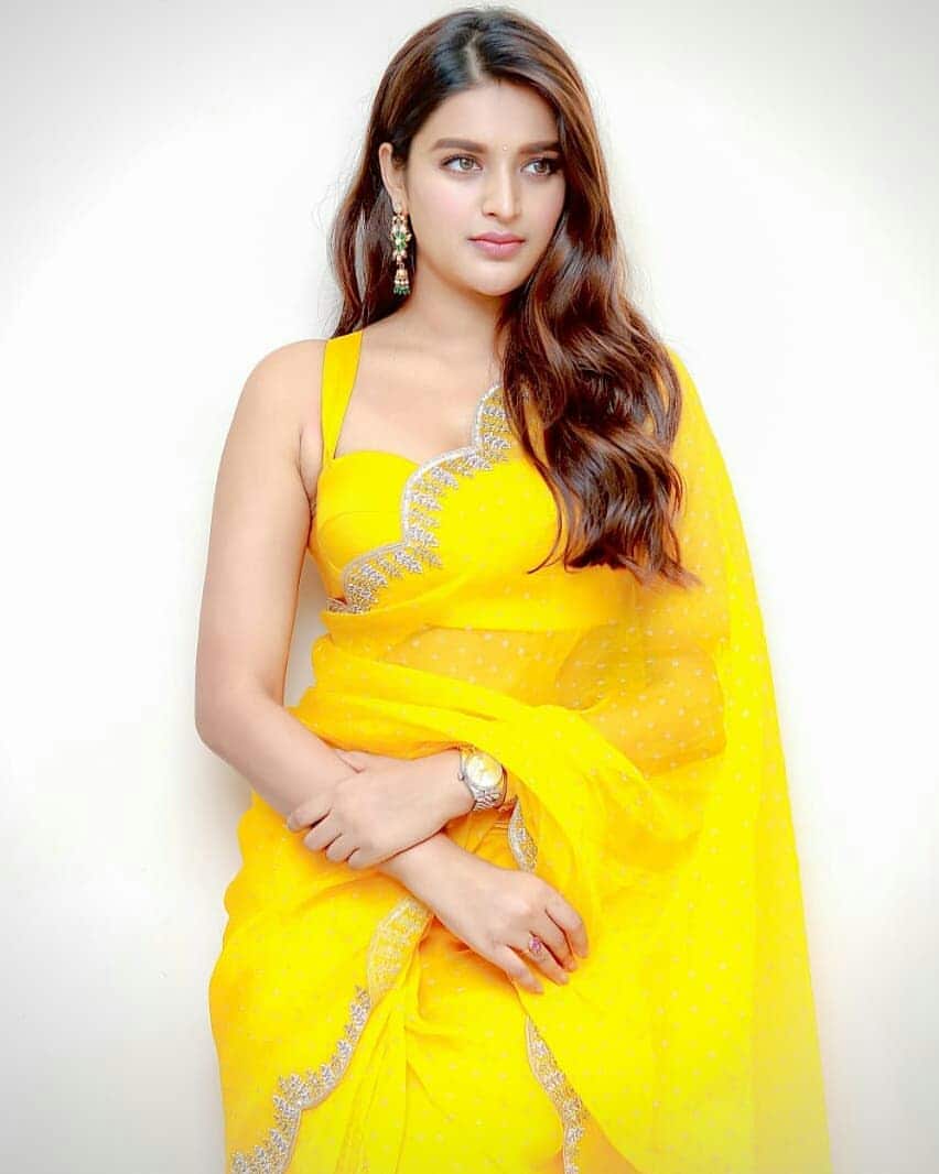  ఆ సినిమా నుండి కేవలం నటన మాత్రమే కాకుండా అందాలతోను అదరగొడుతోంది నిధి. 'సవ్యసాచి'తో తెలుగు ఇండస్ట్రీకి కూడా పరిచయమైన నిధి.. పూరీ జగన్నాథ్ డైరెక్షన్‌లో రామ్ హీరోగా వచ్చిన 'ఇస్మార్ట్ శంకర్' మూవీలో నటించి సూపర్ హిట్ అందుకుంది.. ప్రస్తుతం భూమి అనే ఓ తమిళ చిత్రంతో పాటు ఓ తెలుగులో సినిమాలో ను నటిస్తోంది నిధి.. Photo: Instagram