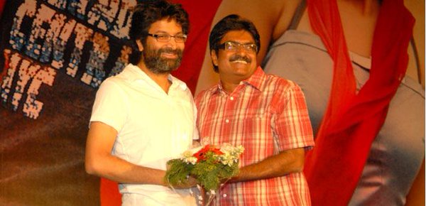 trivikram srinivas,trivikram srinivas twitter,trivikram srinivas sravanthi ravi kishore,trivikram srinivas touches feet sravanthi ravi kishore,trivikram srinivas movies,trivikram srinivas ram movie,trivikram srinivas RED pre release event,telugu cinema,త్రివిక్రమ్,త్రివిక్రమ్ స్రవంతి రవికిషోర్,త్రివిక్రమ్ రెడ్ ప్రీ రిలీజ్ ఈవెంట్,నిర్మాత స్రవంతి రవికిషోర్ కాళ్లు పట్టుకున్న త్రివిక్రమ్