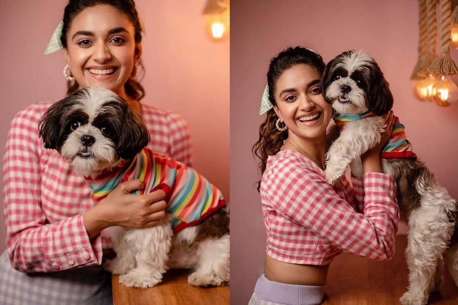  Keerthy Suresh: కీర్తి సురేష్.. ప్రస్తుతం వరుస సినిమాలతో బిజీ బిజీగా ఉన్న హీరోయిన్స్ లో ఒకరు. మహానటి సావిత్రి బయోపిక్ అందరిని మైమరిపించిన బ్యూటీ కీర్తి. అయితే ఈ సినిమా తర్వాత ఊహించిన స్థాయిలో కీర్తి సురేష్ సినిమాలు హిట్ అవ్వలేదు.. కథ ఉన్న హిట్ కొట్టలేకపోయాయ్. ఇక అలాంటి ఈ బ్యూటీ ప్రస్తుతం సర్కారు వారి పాట సినిమాలో కళావతిగా మెరవనుంది. ఇటీవలే విడుదలైన సర్కారు వారి పాట టీజర్ లో కళావతిగా కీర్తి ఆకట్టుకుంది. ఇక అలాంటి ఈ బ్యూటీ కోన్ని రోజుల క్రితం తన కుక్కతో ఓనమ్ పండుగ జరుపుకుంది. అందుకు సంబంధించిన ఫోటోలు షేర్ చెయ్యగా అవి వైరల్ గా మారయ్. ఇక ఇప్పుడు మళ్ళీ తన కుక్క నిక్ తో ఫోటోలు తీసుకోని షేర్ చెయ్యగా అవి వైరల్ గా మారాయ్.. ఆ ఫోటోలు చూస్తే ఎవరైనా సరే వావ్ అంటారు.. అంత అందంగా ఉన్నాయ్ ఆ ఫోటోలు.
