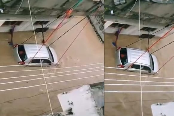 Viral Video: అతడి ప్లాన్ మామూలుగా లేదుగా..వరద నీటిలో కారు కొట్టుకుపోకుండా ఏం చేశాడో చూడండి