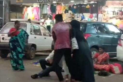 మందుబాబుని చెప్పుతో కొట్టిన మహిళ