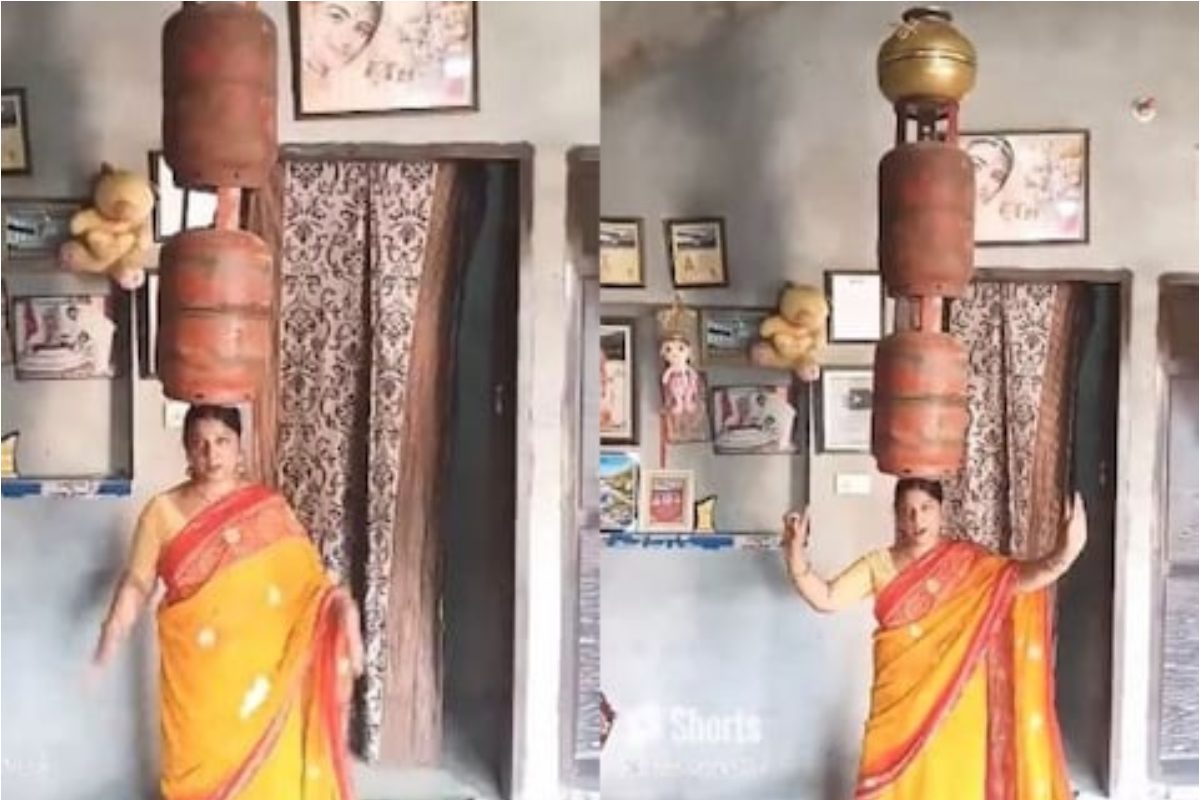सिर पर दो गैस सिलेंडर रखकर डांस कर रही महिला..वीडियो वायरल सिर पर दो गैस सिलेंडर रखकर डांस कर रही महिला..वीडियो वायरल