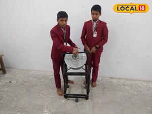 మహిళ వంట మిత్ర పరికరంతో విద్యార్థులు