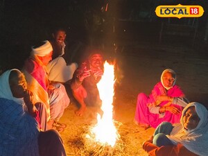 చలి మంటలు కాగుతున్న వృద్ధులు 