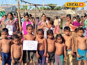 మెడకు ఉరితాళ్లు బిగించి గిరిజనుల నిరసన