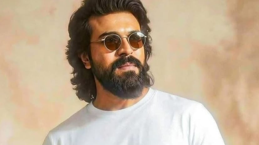గ్లోబల్ స్టార్ రామ్ చరణ్ హీరోగా, ఉప్పెన ఫేమ్ బుచ్చిబాబు సనా దర్శకత్వంలో తెరకెక్కుతున్న మోస్ట్ అవేటెడ్ విలేజ్ స్పోర్ట్స్ డ్రామా ‘పెద్ది’. జూన్ 04న ప్రపంచవ్యాప్తంగా గ్రాండ్ రిలీజ్ కాబోతున్న ఈ సినిమాకు సంబంధించిన ప్రమోషన్లు ప్రస్తుతం దేశవ్యాప్తంగా ఊపందుకున్నాయి. ముంబైలో జరిగిన భారీ ట్రైలర్ లాంచ్ ఈవెంట్ మొదలుకొని, భోపాల్, బెంగళూరు నగరాల్లో నిర్వహించిన ప్రమోషనల్ ఈవెంట్స్ వరకు మెగా పవర్ స్టార్ రామ్ చరణ్ లుక్స్ సోషల్ మీడియాను షేక్ చేస్తున్నాయి. అయితే, ఈ వేడుకలన్నింటిలో రామ్ చరణ్ పక్కన ‘షాడో’లా నిలుస్తూ, ఒక రక్షణ కవచంలా కనిపిస్తున్న ఒక భారీ కటౌట్ నెటిజన్ల దృష్టిని అమితంగా ఆకర్షిస్తోంది. ఆయనే చరణ్ కొత్త బాడీగార్డ్. గ్లోబల్ స్టార్ రామ్ చరణ్ హీరోగా, ఉప్పెన ఫేమ్ బుచ్చిబాబు సనా దర్శకత్వంలో తెరకెక్కుతున్న మోస్ట్ అవేటెడ్ విలేజ్ స్పోర్ట్స్ డ్రామా ‘పెద్ది’. జూన్ 04న ప్రపంచవ్యాప్తంగా గ్రాండ్ రిలీజ్ కాబోతున్న ఈ సినిమాకు సంబంధించిన ప్రమోషన్లు ప్రస్తుతం దేశవ్యాప్తంగా ఊపందుకున్నాయి. ముంబైలో జరిగిన భారీ ట్రైలర్ లాంచ్ ఈవెంట్ మొదలుకొని, భోపాల్, బెంగళూరు నగరాల్లో నిర్వహించిన ప్రమోషనల్ ఈవెంట్స్ వరకు మెగా పవర్ స్టార్ రామ్ చరణ్ లుక్స్ సోషల్ మీడియాను షేక్ చేస్తున్నాయి. అయితే, ఈ వేడుకలన్నింటిలో రామ్ చరణ్ పక్కన ‘షాడో’లా నిలుస్తూ, ఒక రక్షణ కవచంలా కనిపిస్తున్న ఒక భారీ కటౌట్ నెటిజన్ల దృష్టిని అమితంగా ఆకర్షిస్తోంది. ఆయనే చరణ్ కొత్త బాడీగార్డ్.