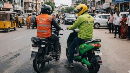 Uber Rapido Merger (ఏఐ చిత్రం) Uber Rapido Merger (ఏఐ చిత్రం)