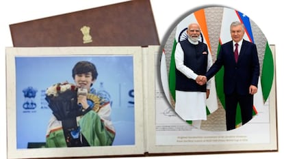 ఉజ్బెకిస్థాన్ అధ్యక్షుడికి సిందారోవ్ వరల్డ్ కప్ స్కోర్షీట్ను బహూకరించిన ప్రధాని మోదీ (Image - AP and ANI) ఉజ్బెకిస్థాన్ అధ్యక్షుడికి సిందారోవ్ వరల్డ్ కప్ స్కోర్షీట్ను బహూకరించిన ప్రధాని మోదీ (Image - AP and ANI)