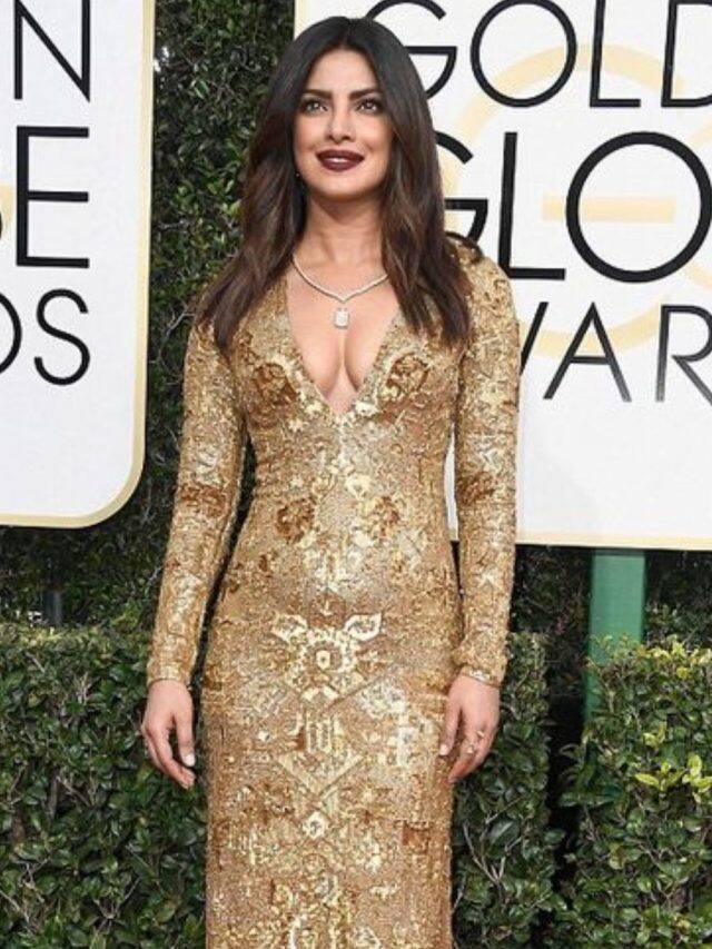 actress in golden dress Emma Stone Bags Golden Globe Best Actress in a Comedy in a Shimmering Louis  Vuitton Gown and Open-Toe Heels