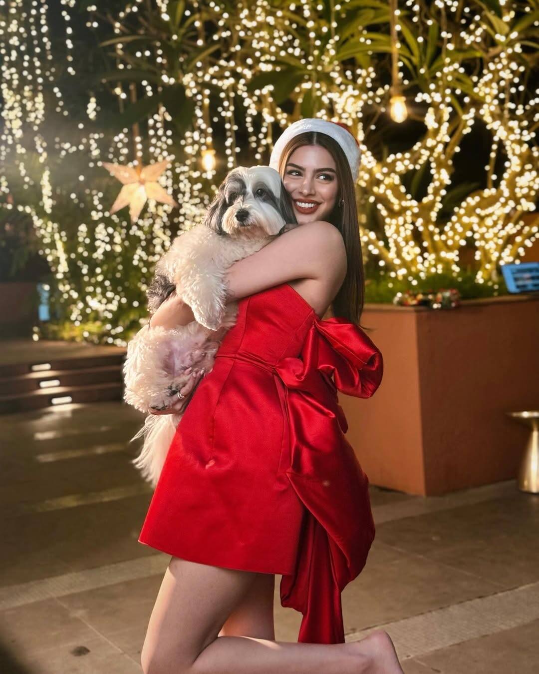 khushi kapoor red dress Khushi Kapoor captivates hearts with her holiday look in a red mini dress with a trail