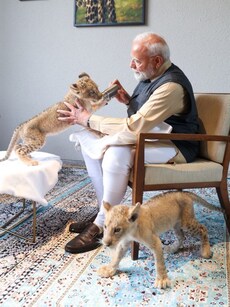 PM Modi Visits Vantara: Feeds Lion Cubs, Plays with Orangutan