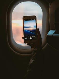 Dimming Lights to Airplane Mode: What In-Flight Rules Really Mean