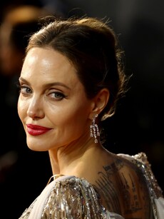 Know the stories behind 8 tattoos inked on Angelina Jolie